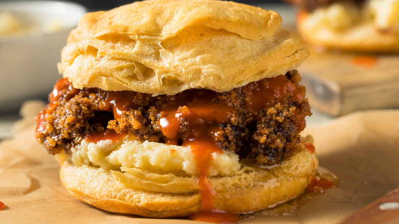 A hot honey chicken biscuit