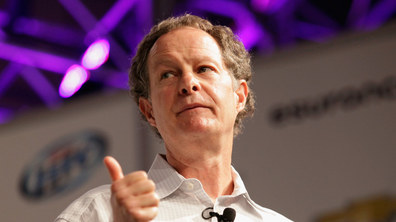 Whole Foods CEO John Mackey giving thumbs up