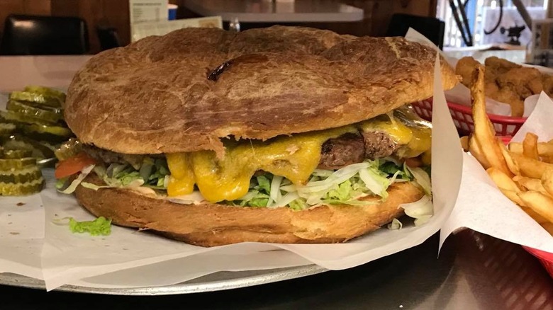 giant burger with french fries