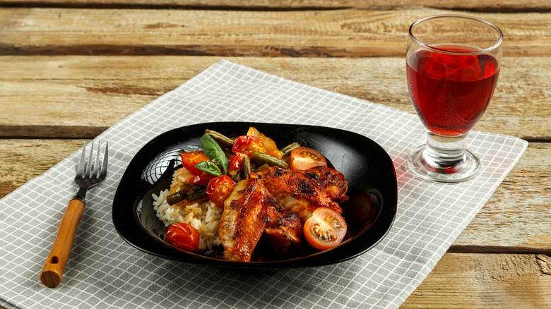 plate of wings with wine