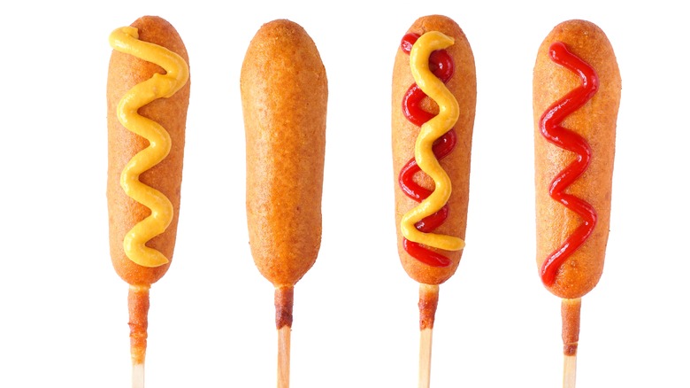 corn dogs with condiments