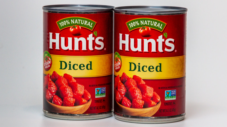 Cans of Hunt's canned tomatoes