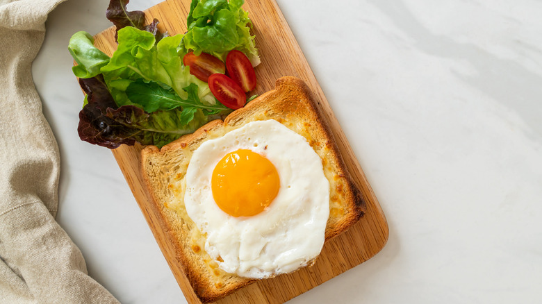 fried egg toast with salad