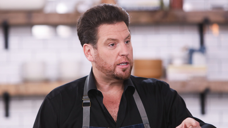 scott conant pointing finger and frowning