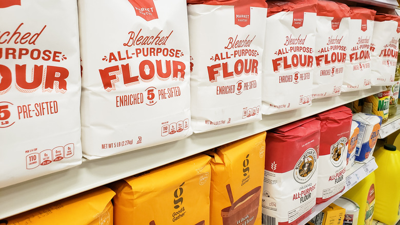 Variety of flours on supermarket shelf