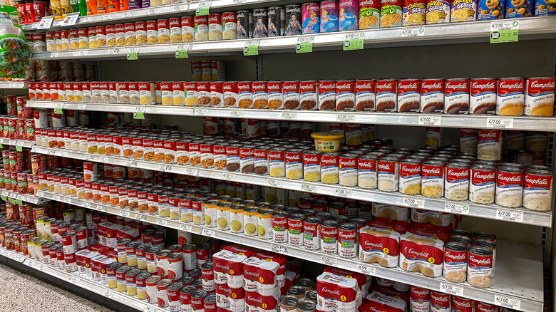 Shelves of supermarket canned soup