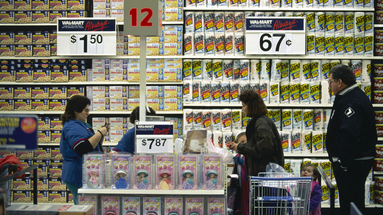 Customers at checkout in Walmart