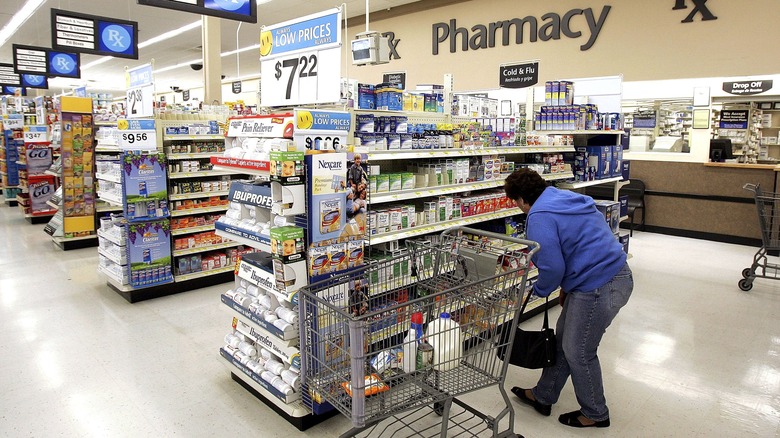 Employee stocking Walmart pharmacy