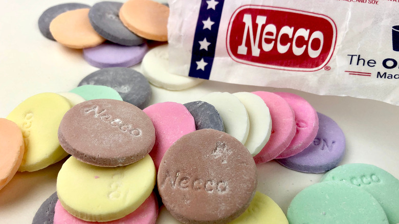 Pile of Necco Wafers beside wrapper