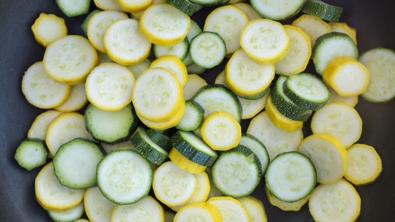 Zucchini piled in pan