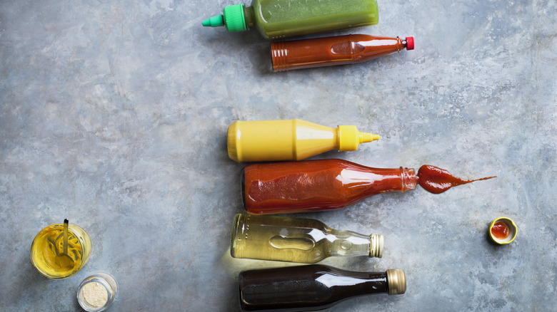 Condiments on gray background