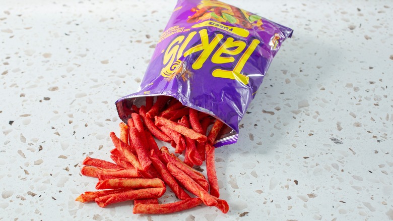 Bag of Fuego Takis spilling on counter