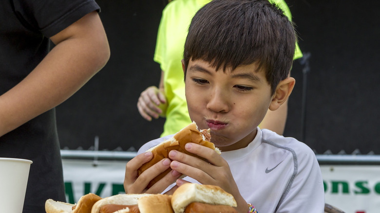 boy in hotdog-eating contest