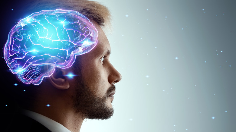 Man with image of working brain superimposed