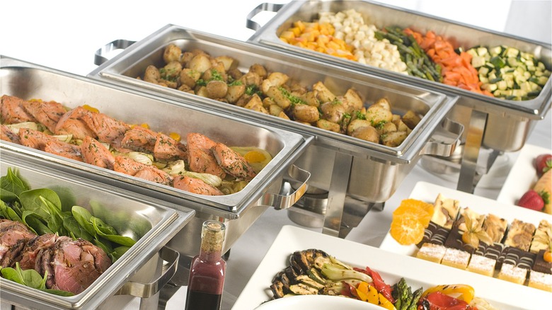 assorted vegetables and meats at buffet