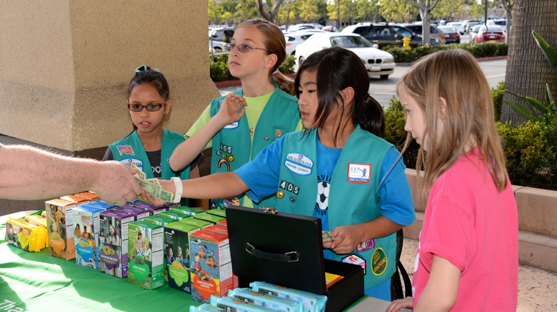 Girl Scouts at work selling cookies