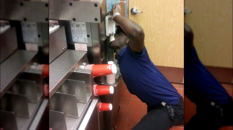 wendy's employee guzzling frosty machine