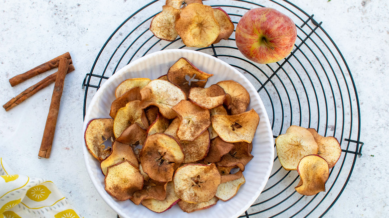 dried apples in white bowl