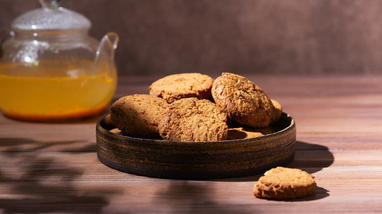 Oatmeal cookies and teapot