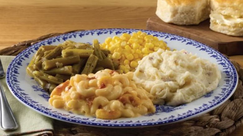 macaroni and cheese, green beans, mashed potatoes, corn, biscuits