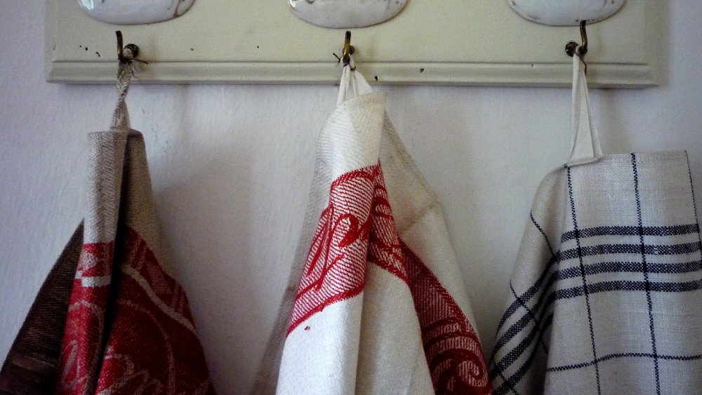 Hand towels hanging on hooks