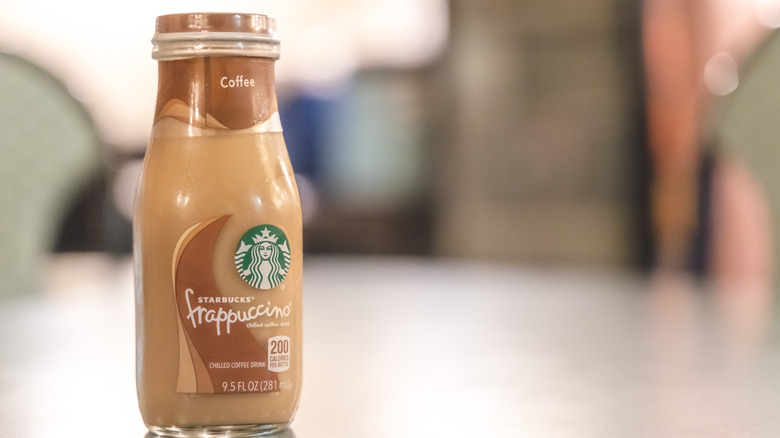 A Starbucks bottled frappuccino over a table 