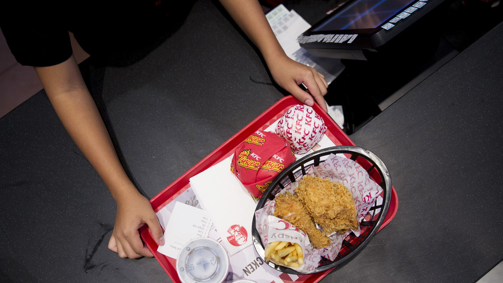 KFC worker serving food