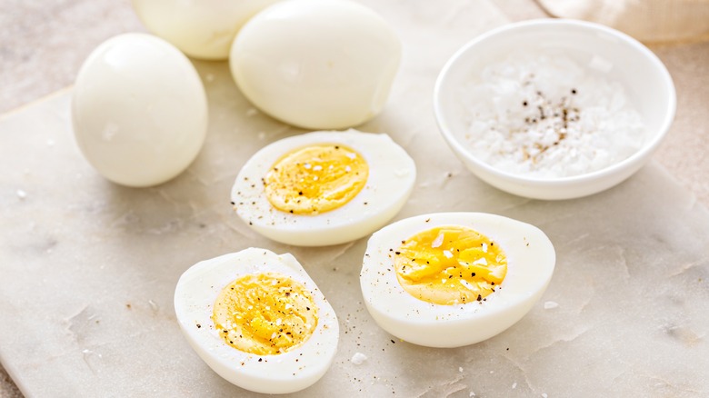 peeled and halved hard-boiled eggs