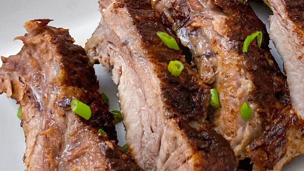 Instant Pot ribs garnished with green onion