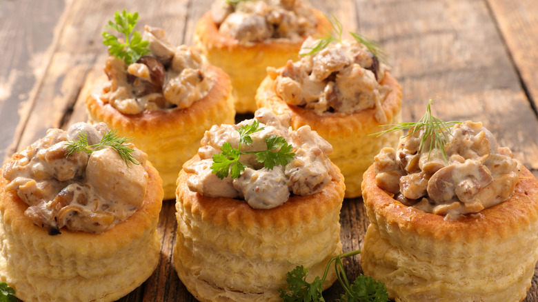 Rows of vol-au-vent with chicken and mushroom filling