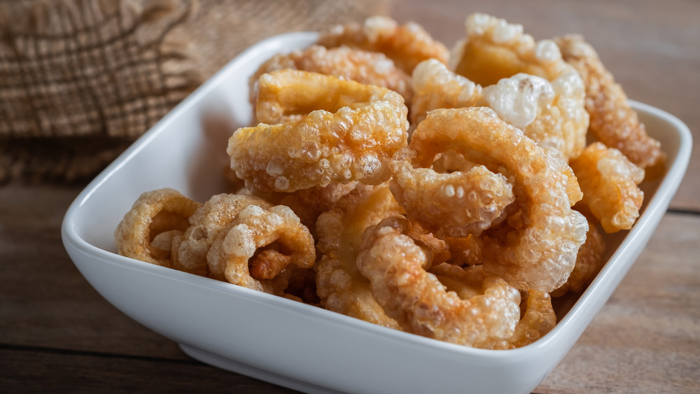 pork rinds in a white bowl