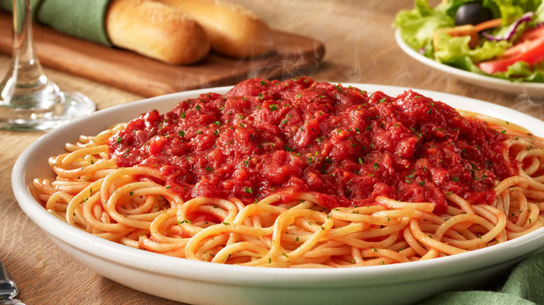 dish of spaghetti with marinara sauce