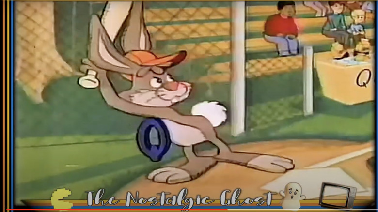 Screenshot from a vintage Nesquik commercial with Quicky playing baseball