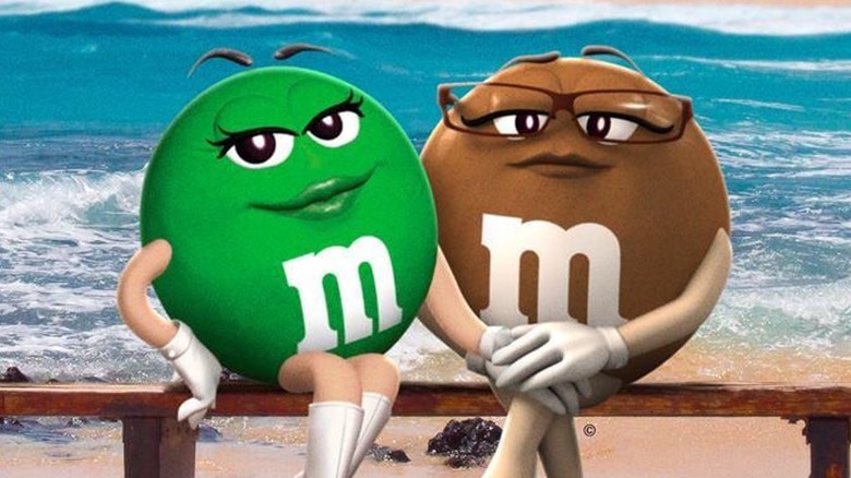 green and brown m&m candy mascots