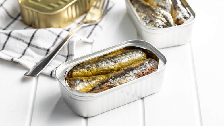 open cans of sardines