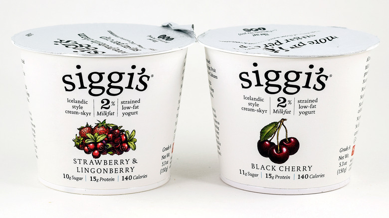 Two cups of Siggi's yogurt in different flavors 