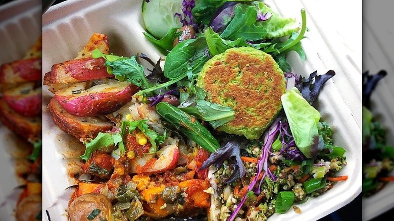 Plate of prepared foods in a container 