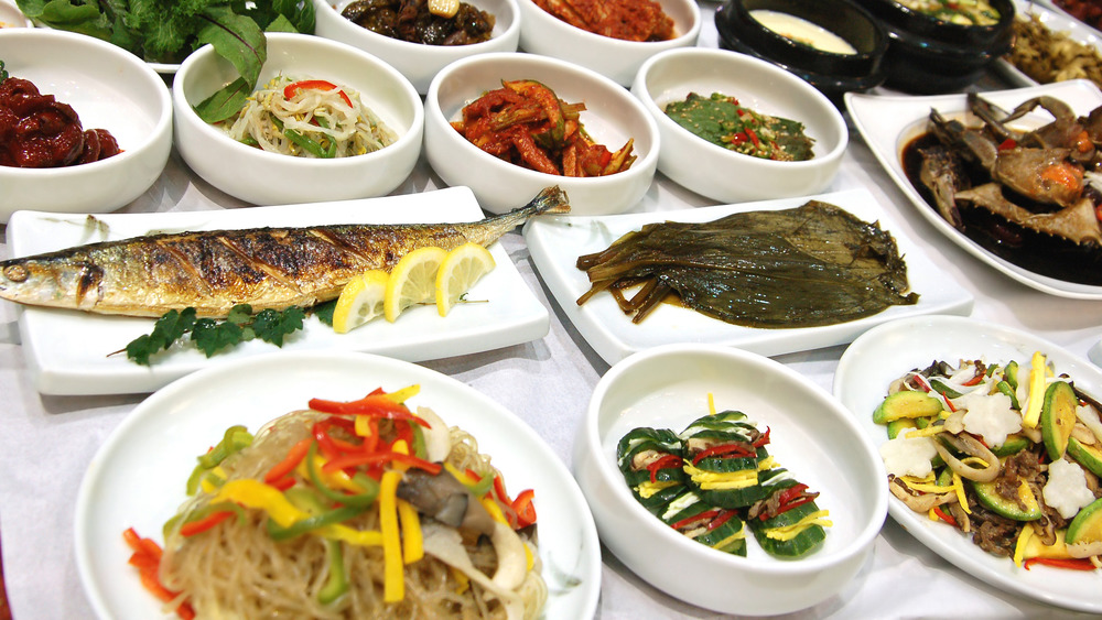 Korean Banchan on table with white bowls