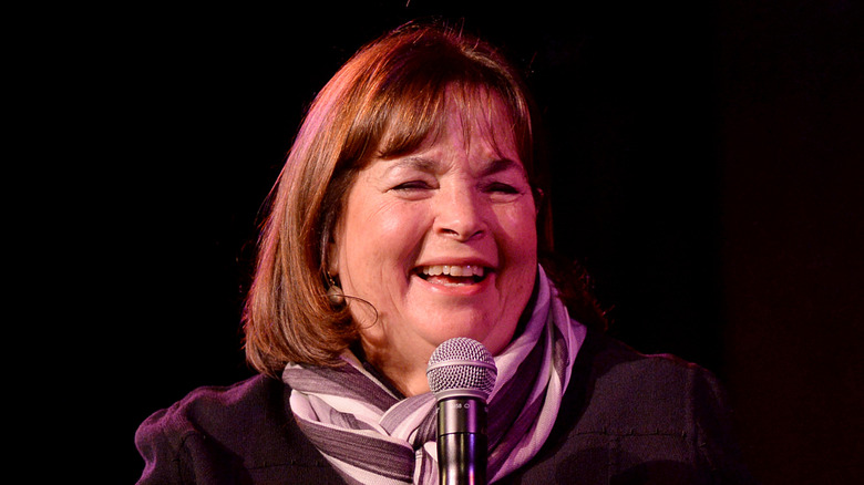 Ina Garten smiling with microphone