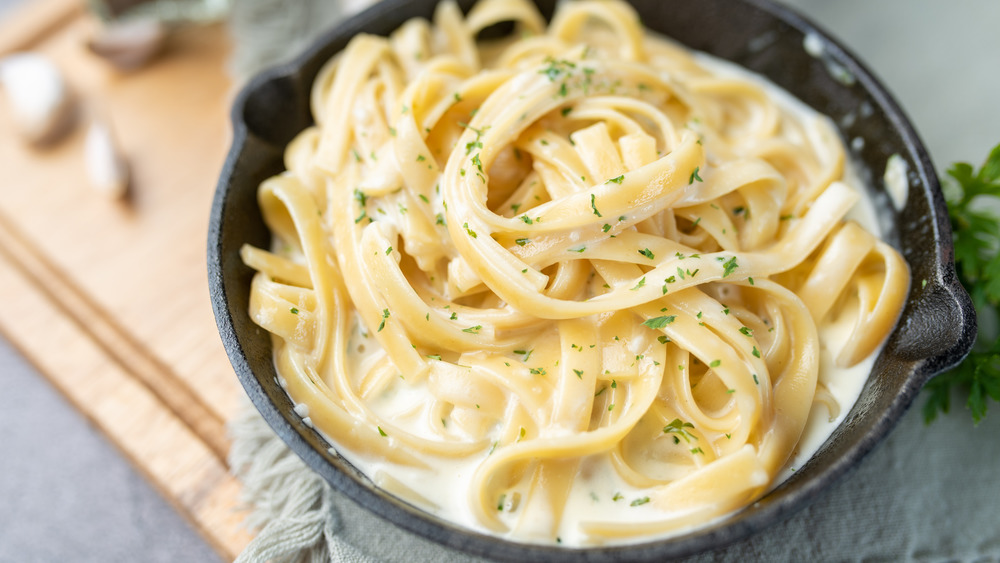 Alfredo sauce on pasta