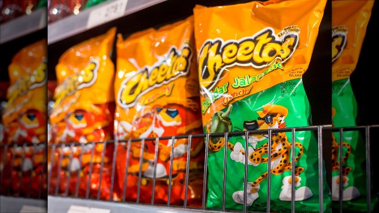 Bags of Cheetos on a shelf