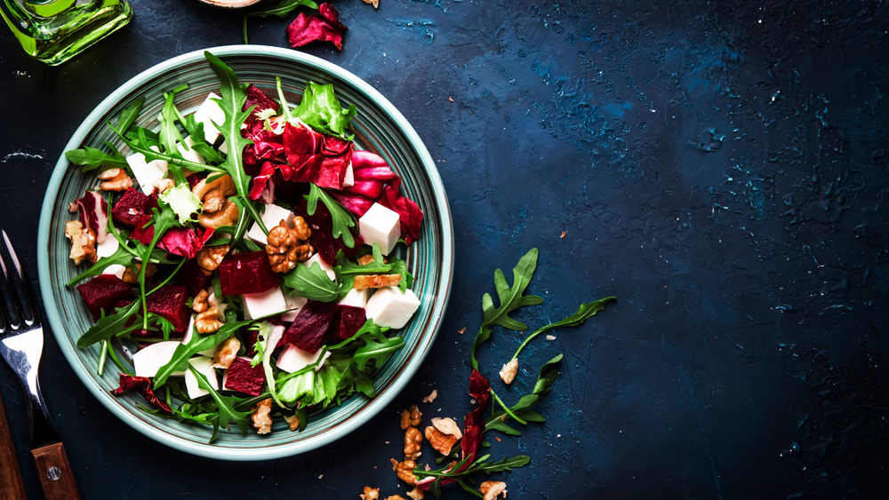 Beet salad with arugula, walnuts, and feta 