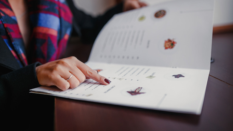 Woman looking at a menu