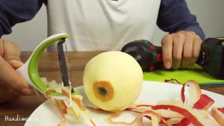 Handimania using a drill to peel an apple