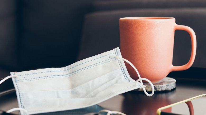 Coffee cup and mask