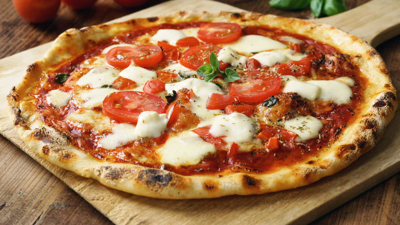 Margherita pizza with fresh toppings and cheese