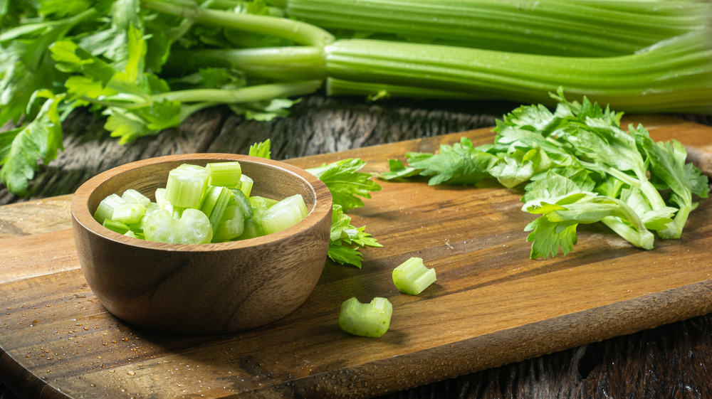 Fresh cut celery on cutting board