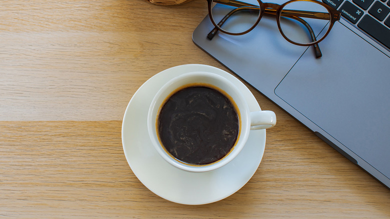 Mug of coffee on desk