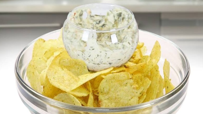 Wine glass holding dip in center of chip bowl