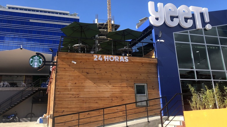 Fake Starbucks in Caracas against blue sky